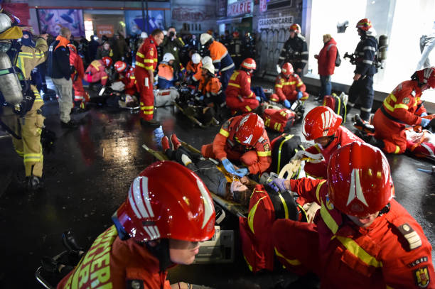 Emergency rescue team in action during the most complex medical exercise in the history of NATO, Vigorous Warrior 19 BUCHAREST, ROMANIA - APRIL 12, 2019: Emergency rescue team in action during the most complex medical exercise in the history of NATO, Vigorous Warrior 19, training to provide multinational medical support, strategic medical evacuation, increasing the level of response to a possible crisis situation. drill team stock pictures, royalty-free photos & images