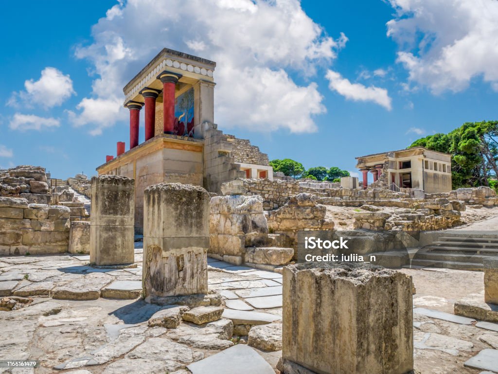 Knossos palace ruins at Crete island, Greece. Famous Minoan palace of Knossos Knossos palace ruins at Crete island, Greece. Famous Minoan palace of Knossos. Knossos Stock Photo