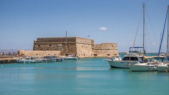 View on a Rocca a Mare fortress and port with boats in Heraklion, Crete island, Greece.