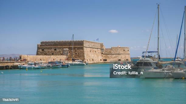 View On A Rocca A Mare Fortress And Port With Boats In Heraklion Crete Island Greece Stock Photo - Download Image Now