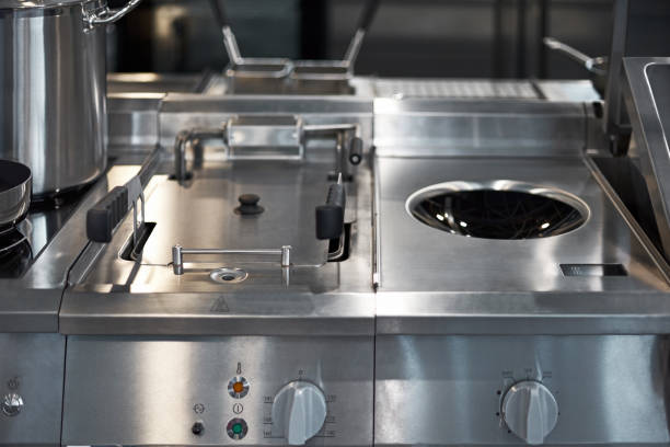 istock Work surface and kitchen equipment in professional kitchen, view counter in stainless steel. 1166162259