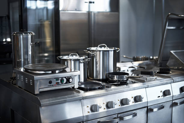 istock Work surface and kitchen equipment in professional kitchen, view counter in stainless steel. 1166162271