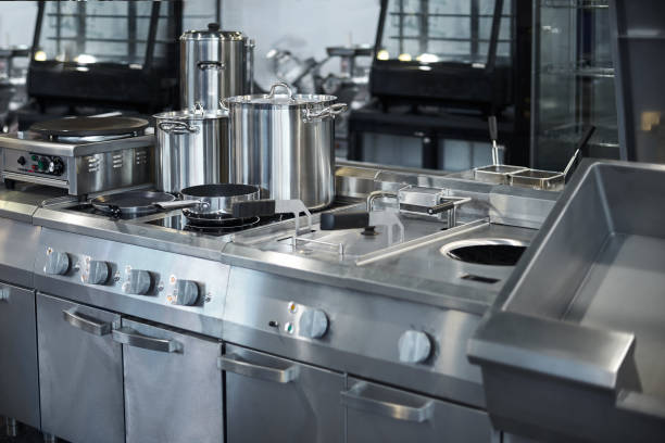 istock Work surface and kitchen equipment in professional kitchen, view counter in stainless steel. 1166162273