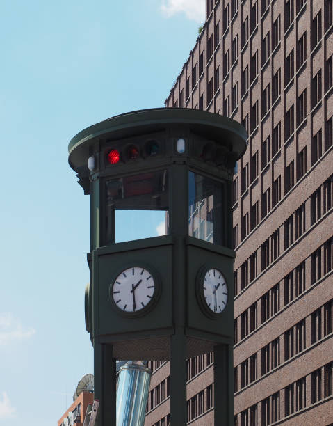 Oldest traffic light in the world, in Berlin Replica of the oldest traffic light in the world in Potsdamer Platz, Berlin, Germany ampelmännchen photos stock pictures, royalty-free photos & images