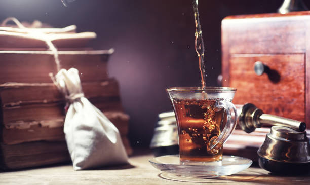 istock Brewing tea on a wooden table 1166163831