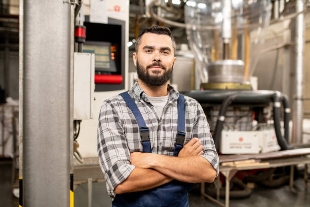 istock Young polymer processing tube engineer with his arms crossed by chest 1166164606