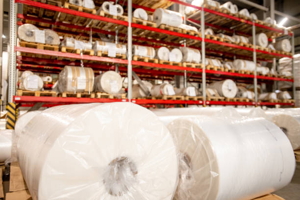 istock Racks of rolled and packed polyethylene film in storage area 1166164715