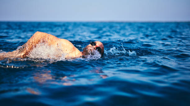 istock Swimmer training on the open sea / ocean. 1166165346