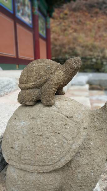 istock Turtle stone sculpture at buddhist temple 1166166484