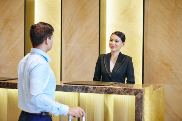 istock Receptionist meeting the guest 1166167253