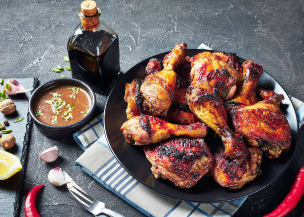 istock Spicy Grilled Jerk Chicken on a plate 1166171002