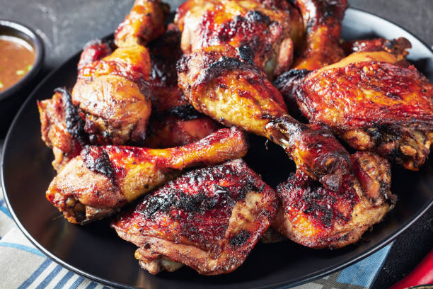 istock Spicy Grilled Jerk Chicken on a plate 1166171059