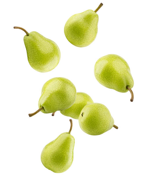 falling pear, isolated on white background, clipping path, full depth of field - pera imagens e fotografias de stock