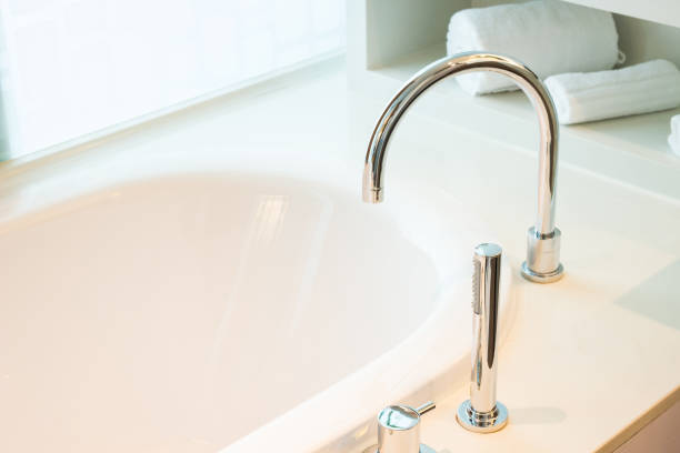 istock Bathroom interior in cozy colors with modern bathtub 1166172944