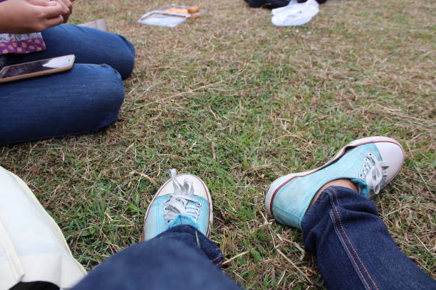 istock Shoes on the grass 1166173702