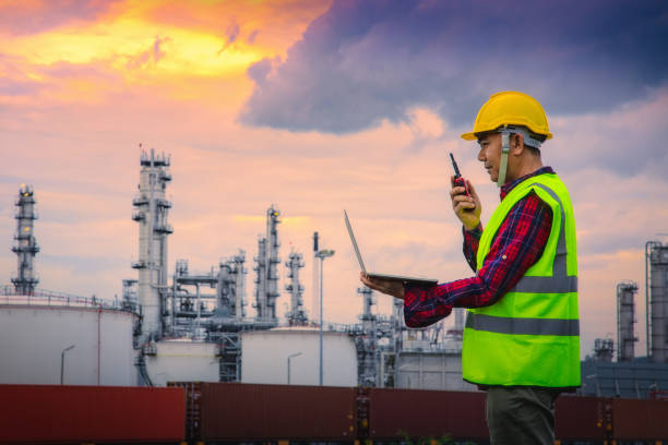 istock Engineer wearing safety helmet at oil refinery industry. 1166175959