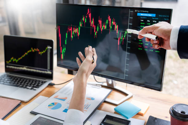 istock Cropped Hands Of Business People Working On Table 1166180160