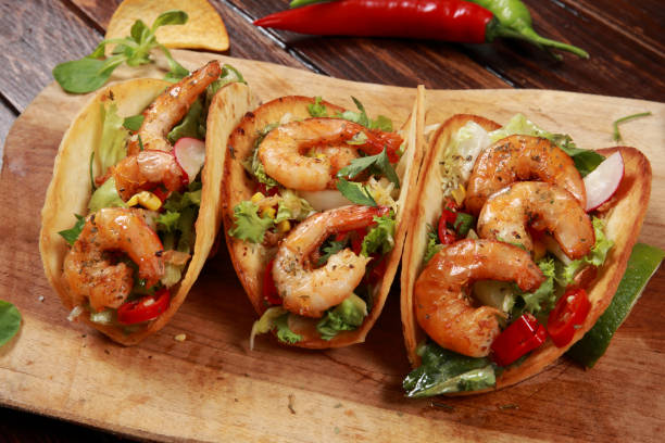 istock Fresh fried Prawns and Shrimps in Tortilla Wrap Sandwich 1166181255