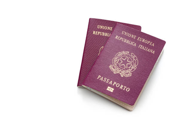 istock Two Italian passports isolated on white background 1166181334