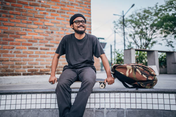 istock Man skater relaxing alone 1166186147