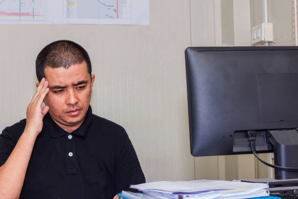 istock A man working hard burn out syndrome 1166186588