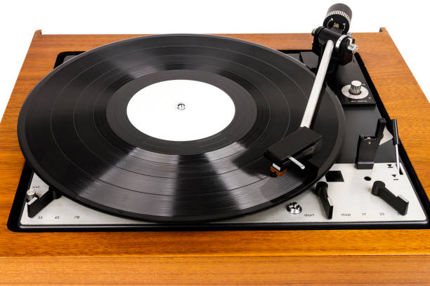 istock Vintage turntable vinyl record player isolated on white 1166189270