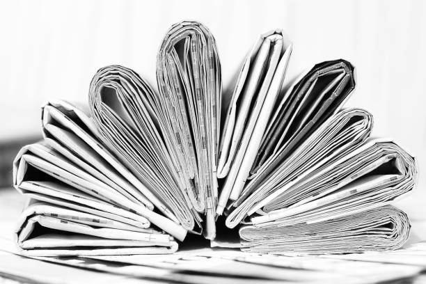 istock Lots of Folded Newspapers 1166191750