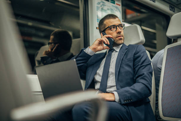 istock Gentleman riding in subway train alone 1166194304