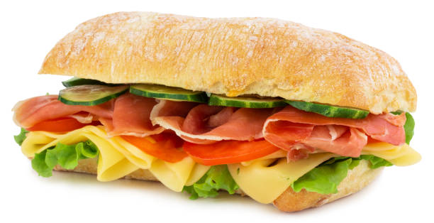 istock Ciabatta sandwich with lettuce, tomatoes prosciutto and cheese isolated on white background 1166197730