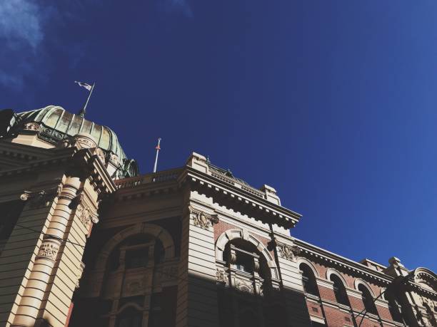 istock Flinders Street Station under blue sky 1166199255