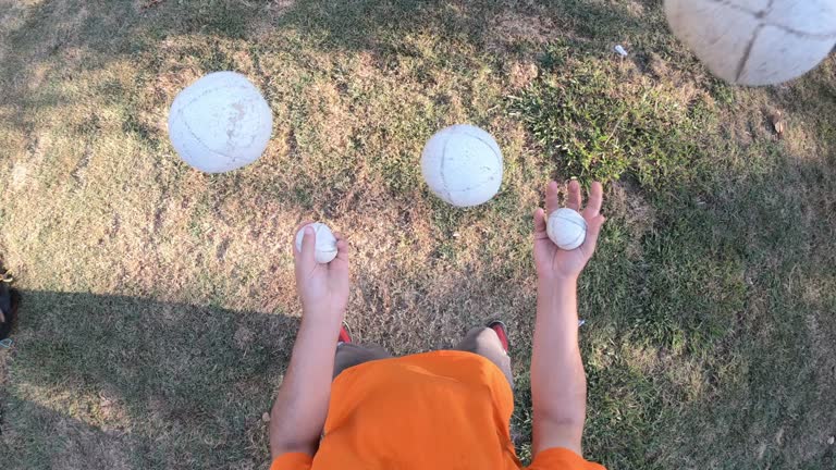 Pov view of a juggler performing at the park