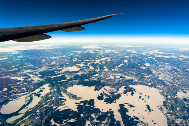 istock Out side above view from airplane side windows when sunrise, transportation and traveler concept 1166203685