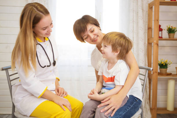 istock Pediatrist examinate young patient's lungs with stethoscope 1166209104