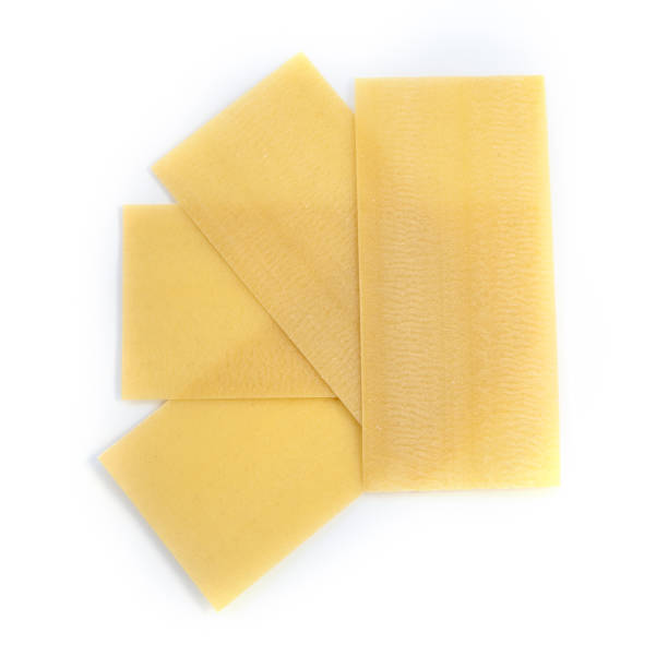 istock Raw pasta lasagne isolated over white background. 1166211508