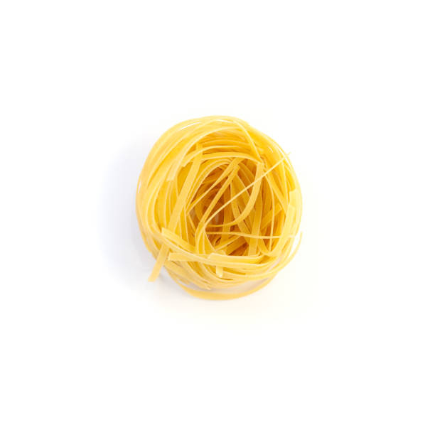 istock Raw pasta fettuccine isolated over white background 1166211522