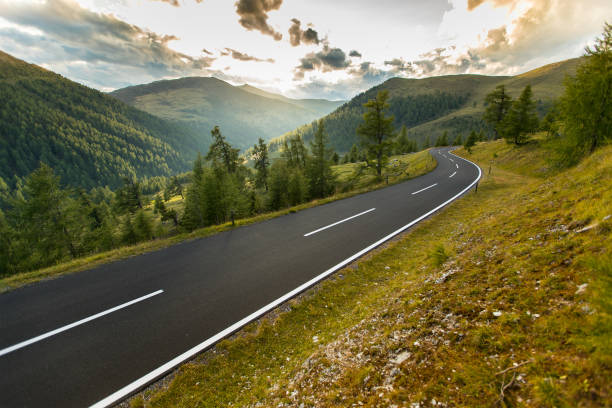 istock Asphalt road in Austria, Alps in a summer day. 1166212511