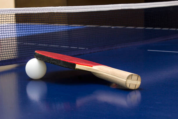 istock table tennis and racket with white ball 1166212804