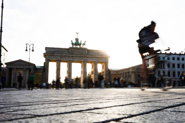 istock Berlin - People cycling at Brandenburg Gate 1166214133