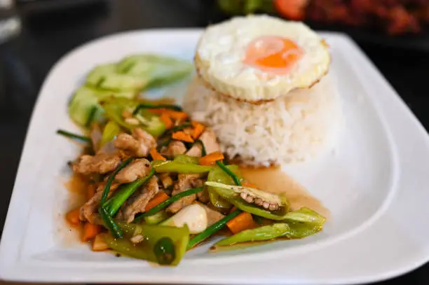 Photo of Fried sweet peper  pork and fried eggs with rice, Thai food