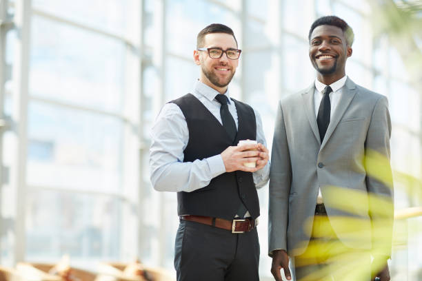 istock Jolly young business colleagues 1166218889