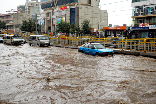 . Addis Ababa - 14 June 2019 : Flooded roads with traffic in the capital city of Ethiopia, Addis Ababa