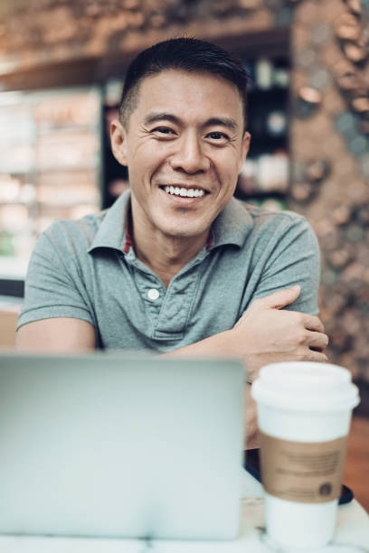 istock Portrait of a smiling middle aged man 1166222137