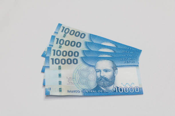 Chilean money notes. Chilean money notes. Chile ten thousand (10000) pesos. Selective focus. colombian peso stock pictures, royalty-free photos & images