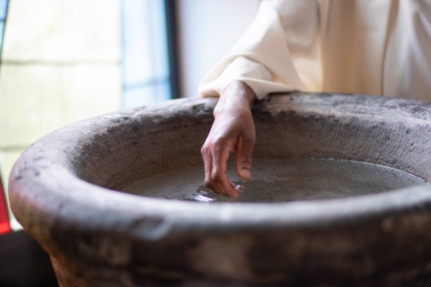 a priest's hand hand of a parish priest baptism photos stock pictures, royalty-free photos & images