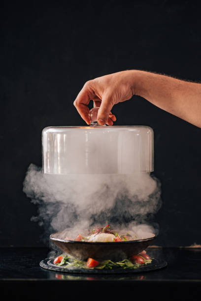 istock Serving burnt caprese salad, on a dark background, copy space. 1166228094