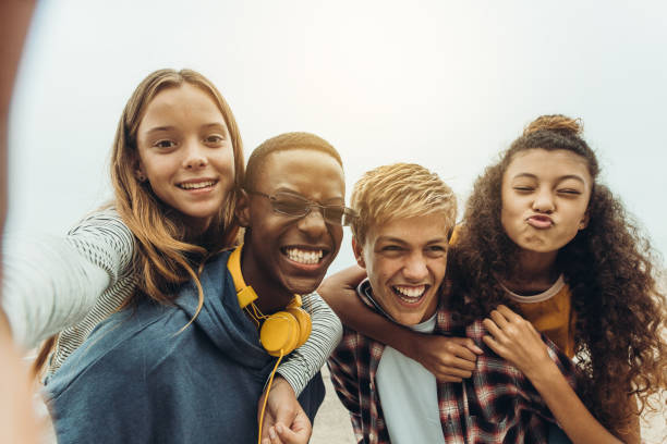 istock Teenage friends having fun taking a selfie 1166230361