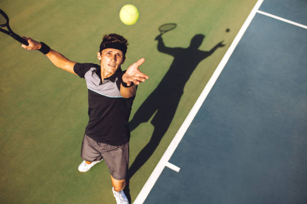 istock Tennis player serving the ball in a match 1166230451