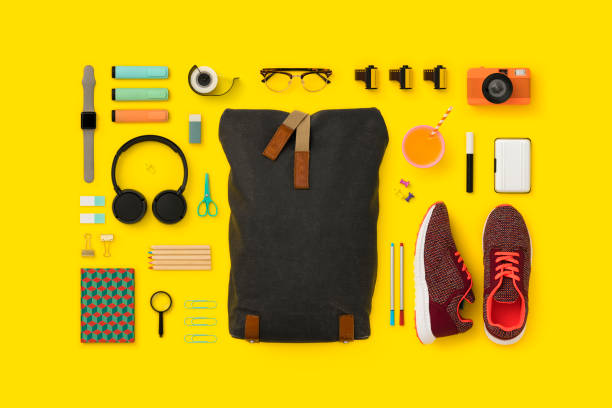 Things in my bag flat lay School supplies and backpack flat lay. Back to school flat lay on yellow background knolling concept stock pictures, royalty-free photos & images