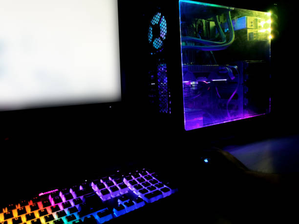 istock rainbow colorful rgb battle station rendering gaming pc led case and mechanical keyboard 1166236364