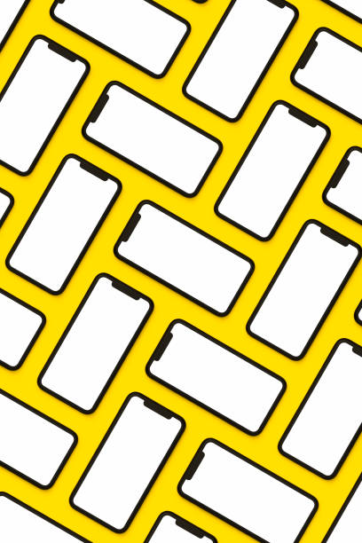 istock Smart phones on yellow background 1166237148